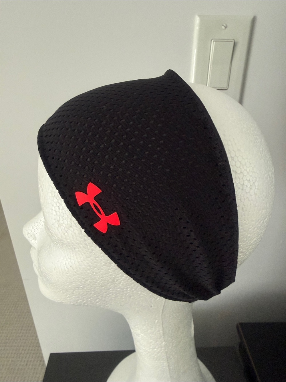 Under Armour Black Performance Headband with orangish Logo